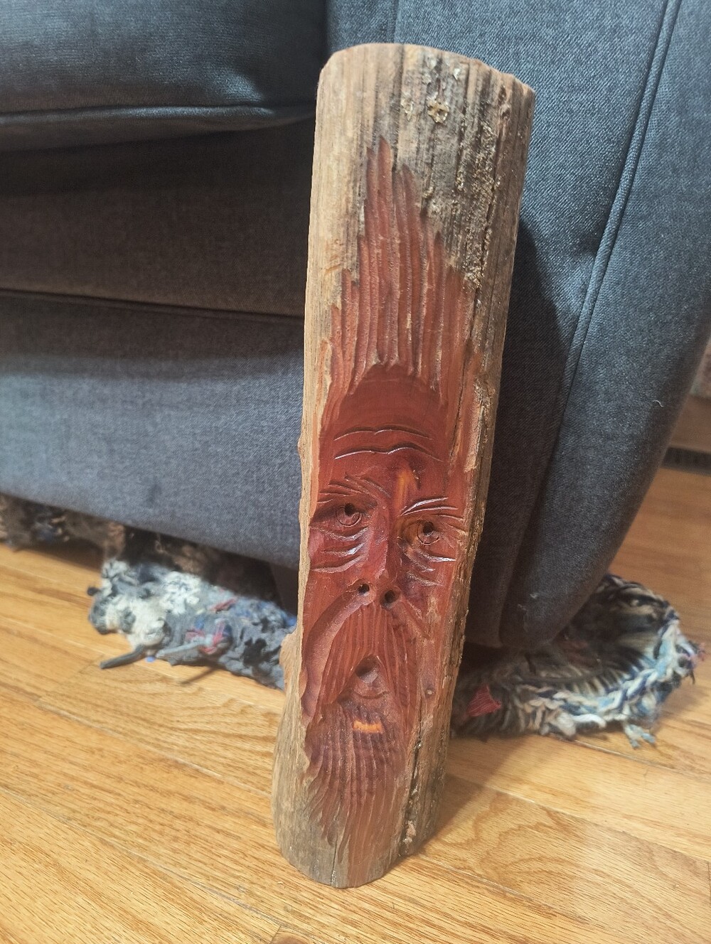 Handmade folk art wood face carving, log sculpture